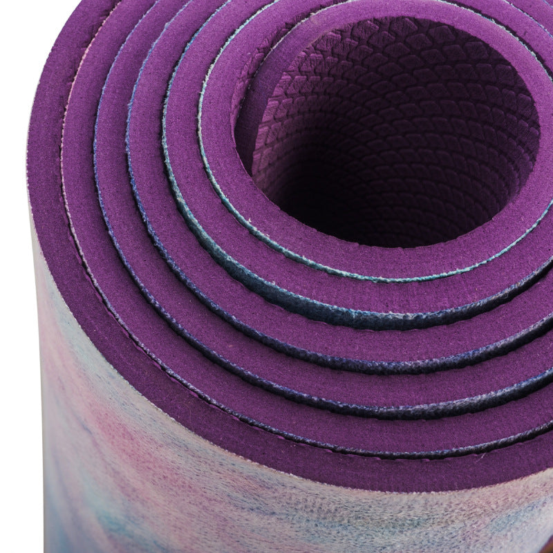 Close-up of a purple yoga mat with a textured surface