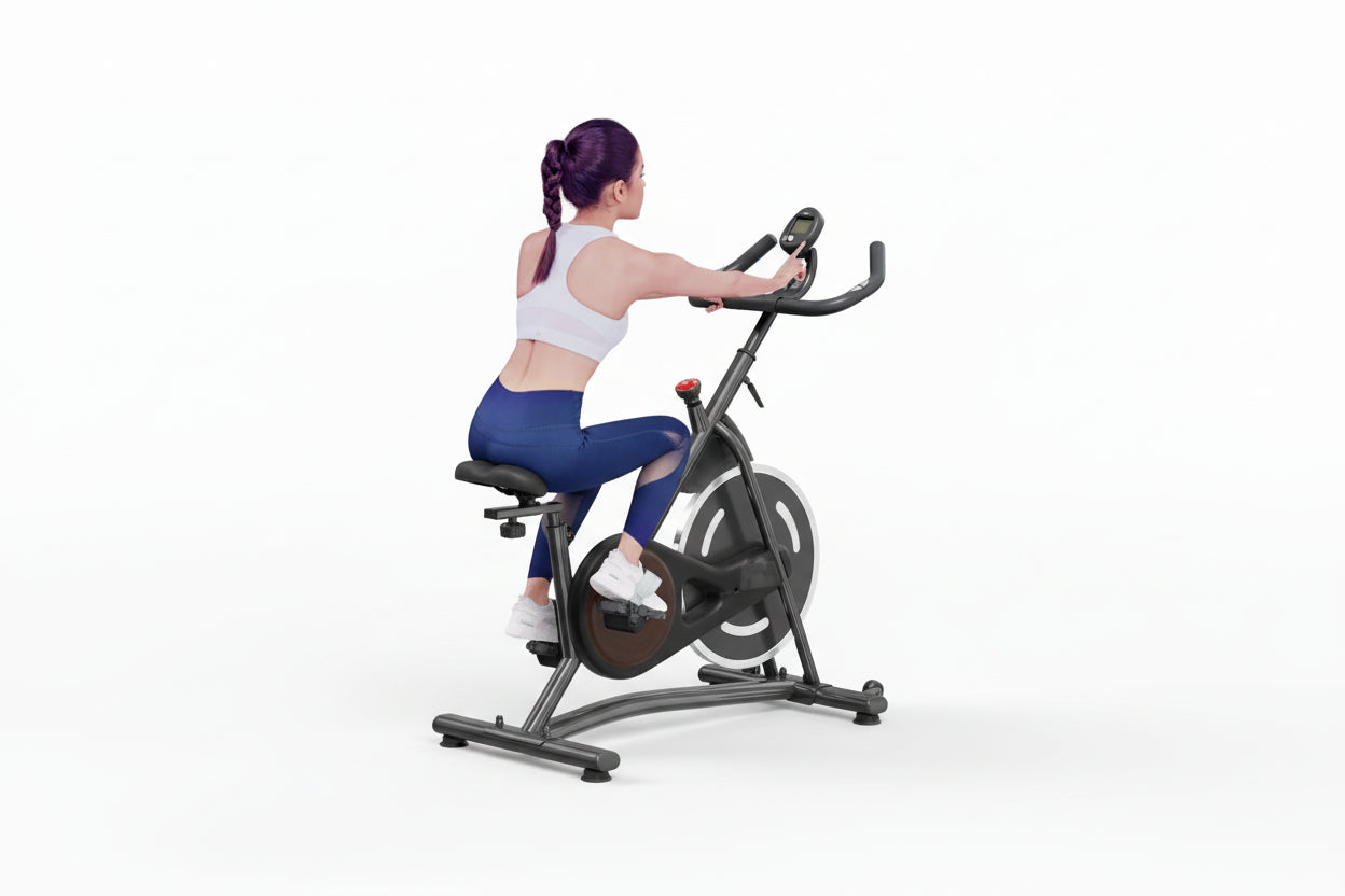 Woman exercising on a stationary bike in a home setting with text 'Real Comfortable Riding Feeling'.