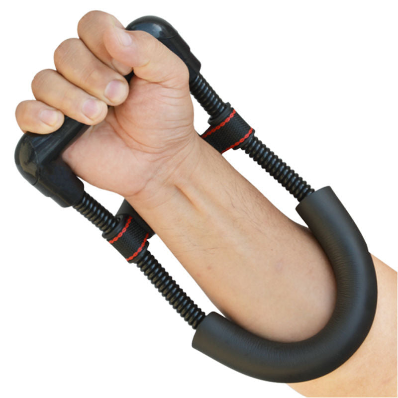 Hand using a black hand gripper on a white background
