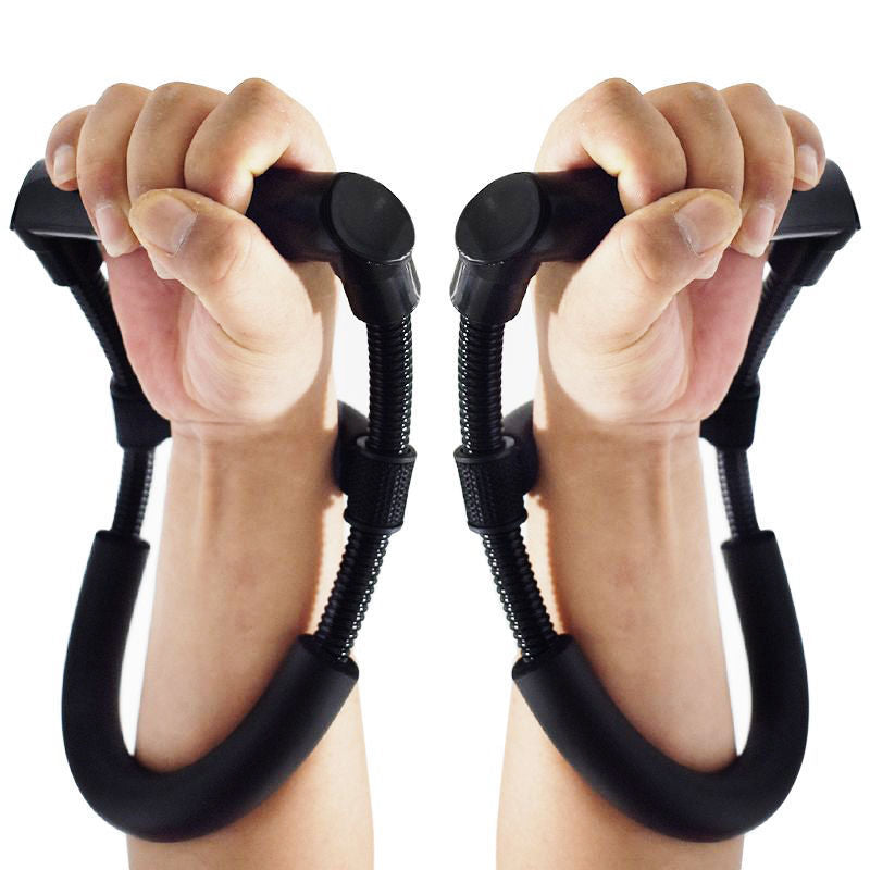 A pair of black wrist and forearm exercise handles being held by two hands against a plain white background.
